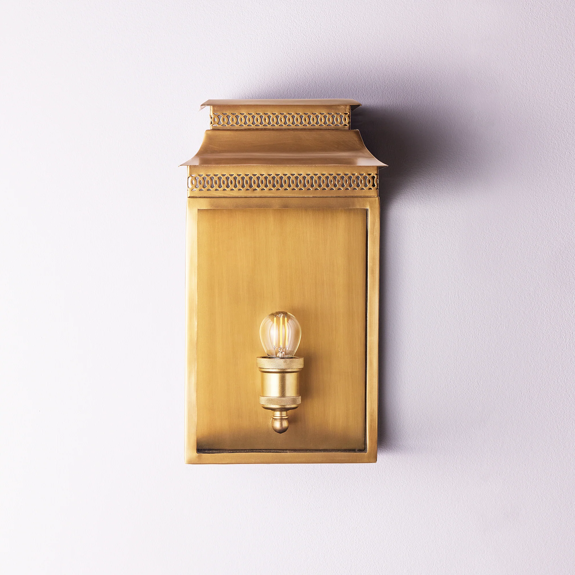 Hastings wall sconce in antiqued brass - Image 5