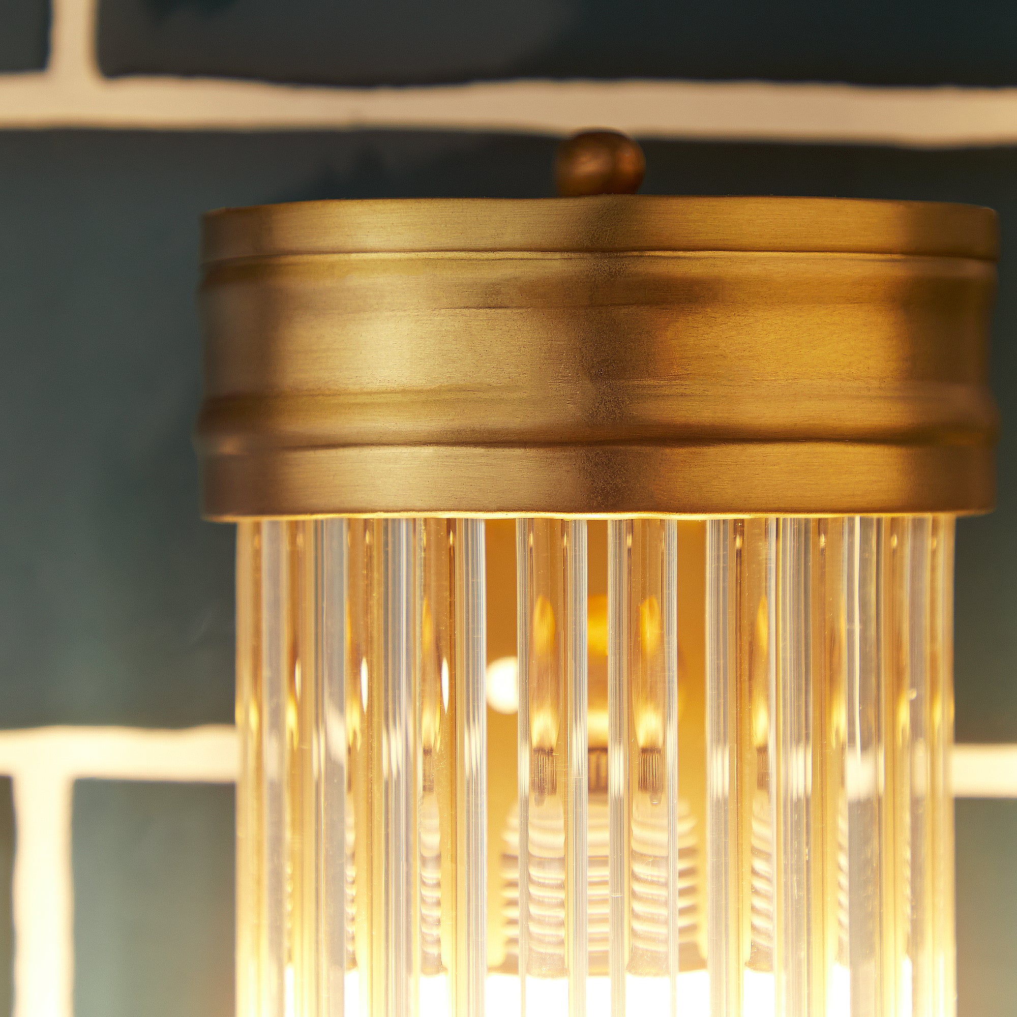 Long Roddy wall sconce in antiqued brass with glass rods - Image 8