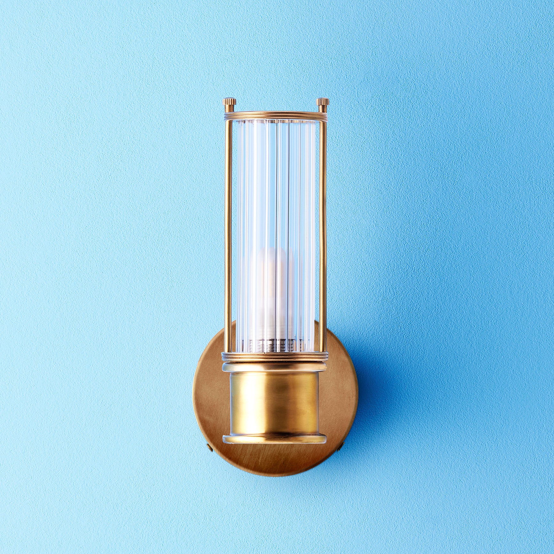 Smaller Hunter wall sconce in antiqued brass and glass - Image 3