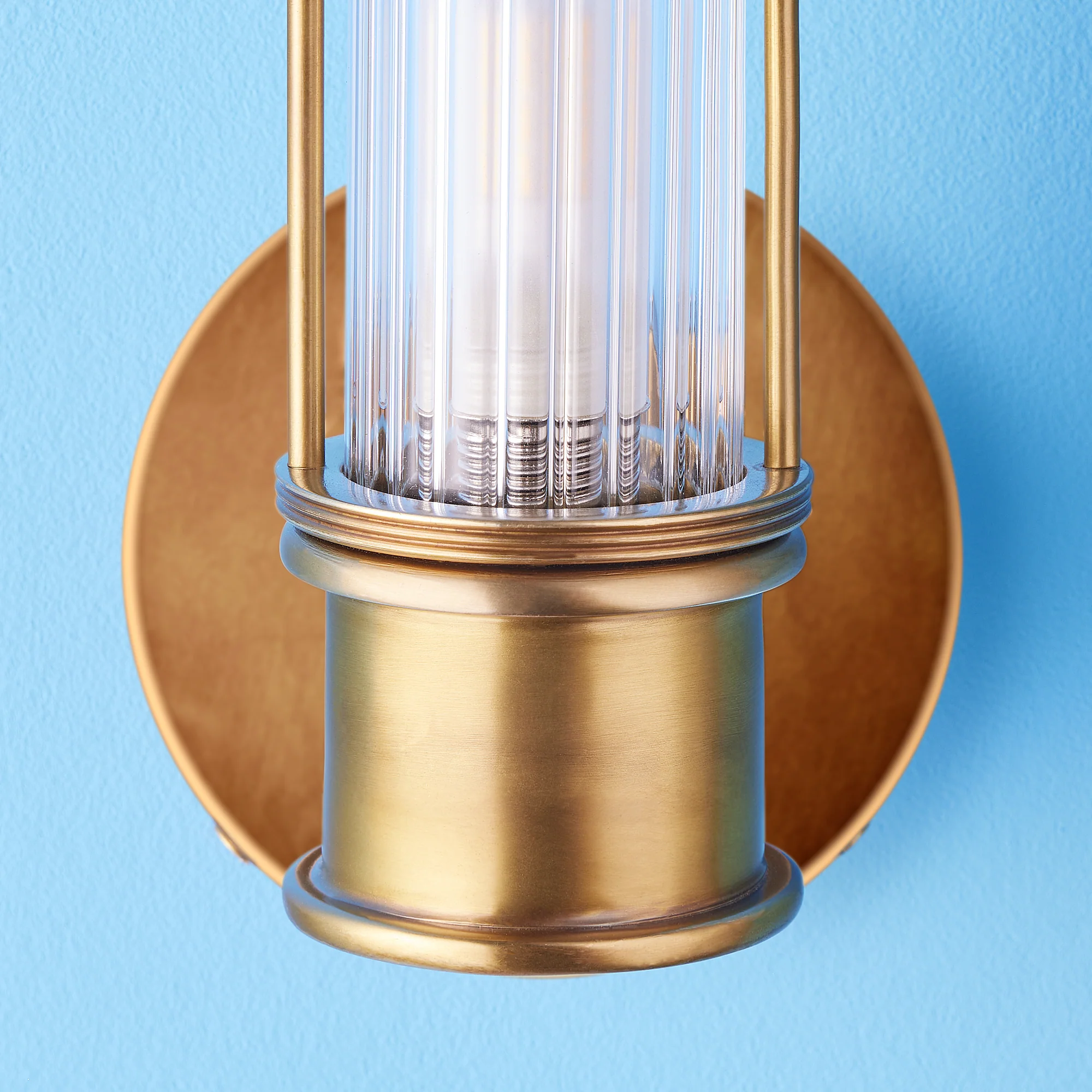 Smaller Hunter wall sconce in antiqued brass and glass - Image 8